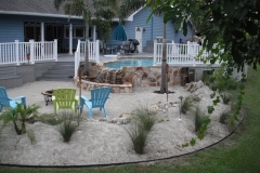 Beach at entrance of pool